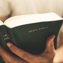 Closeup shot of reading holy bible.